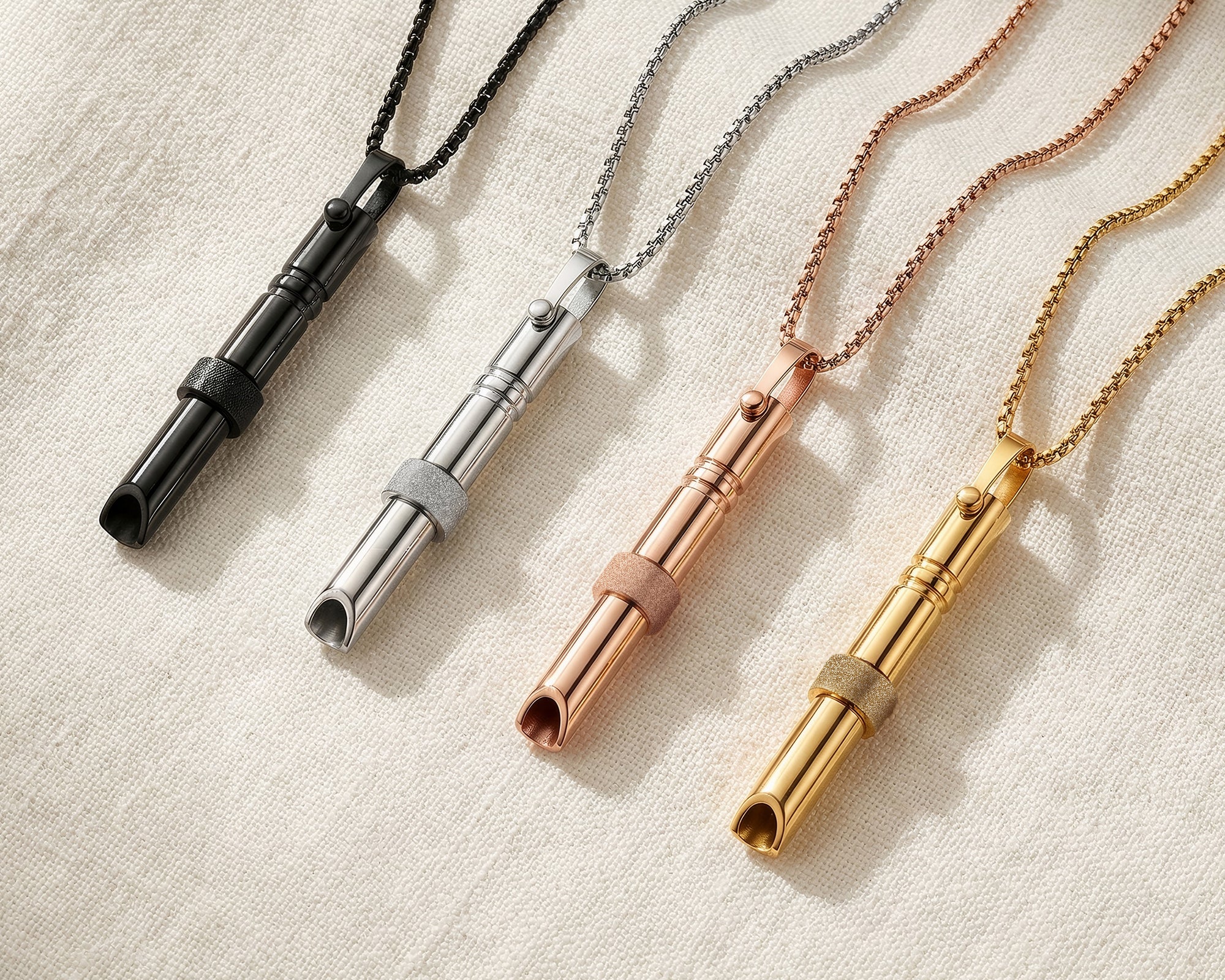 Calmera 316L stainless steel breathing necklace in black silver rose gold and gold finishes