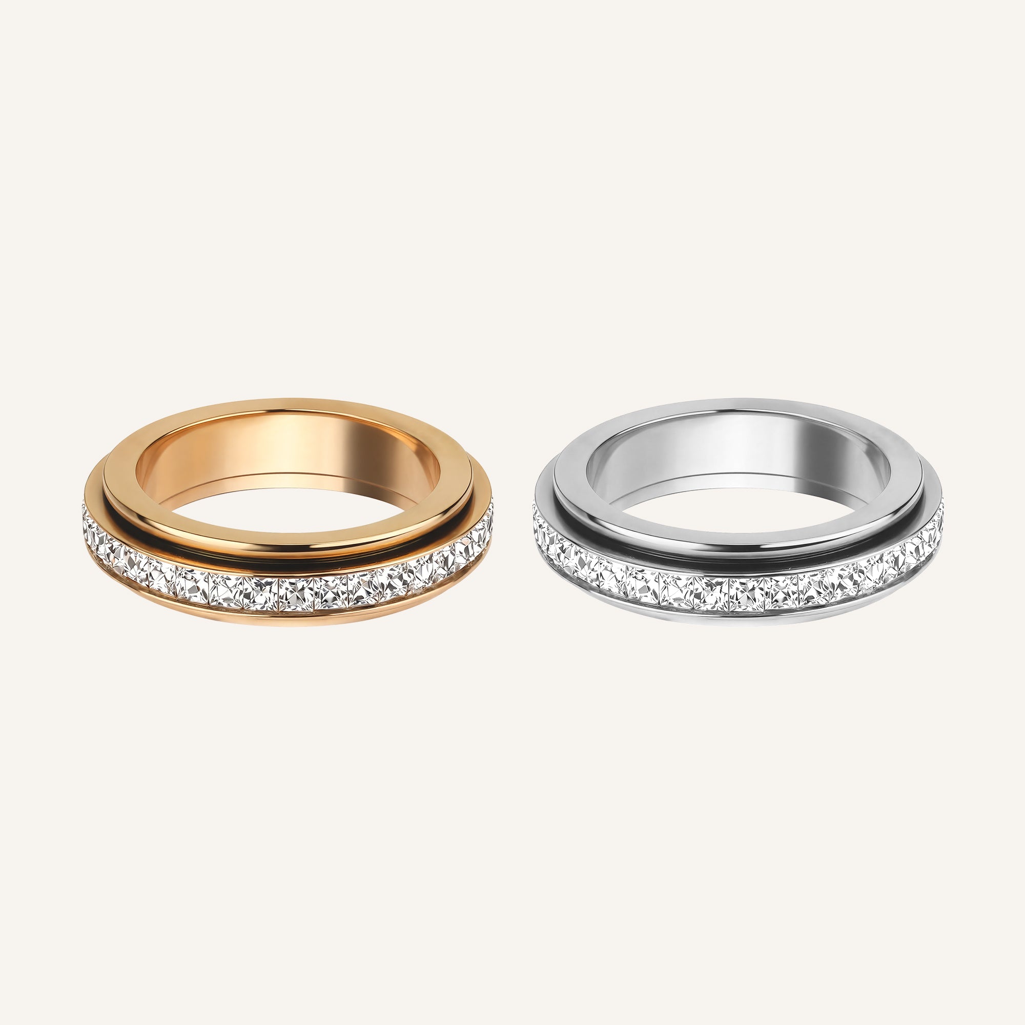 Calmera two-tone crystal spinner ring in gold and silver finishes